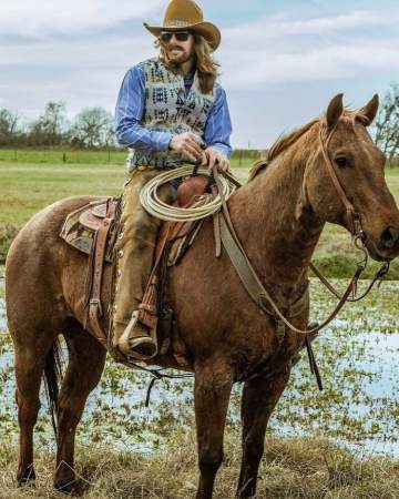 The rodeo contestant Dale Brisby and his horse, Boone. 